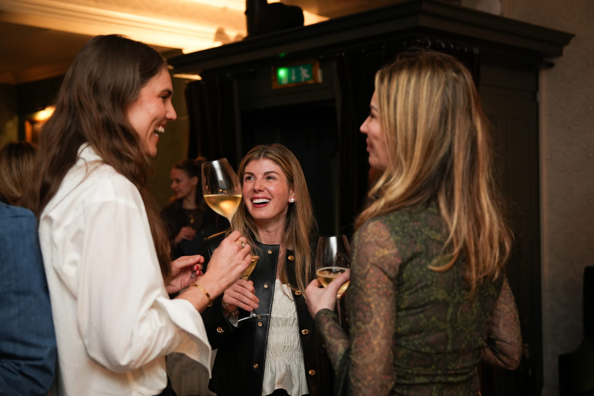 Guests networking during a conference reception at No. 30 Knightsbridge